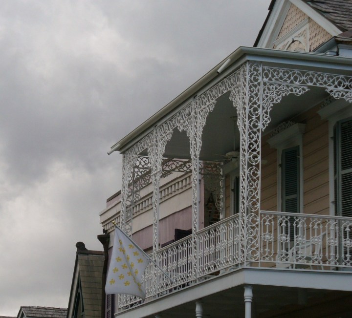 French Quarter balcony under storm clouds