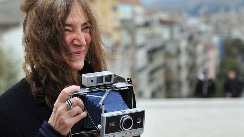 Patti Smith with camera - photo credit: cbc.ca